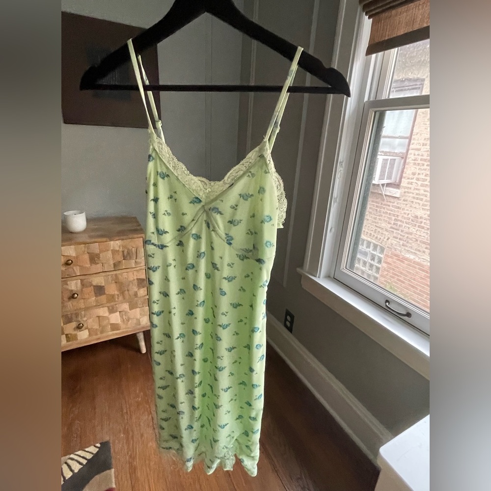 Y2K mini dress. Green with blue flowers and lace outline size small